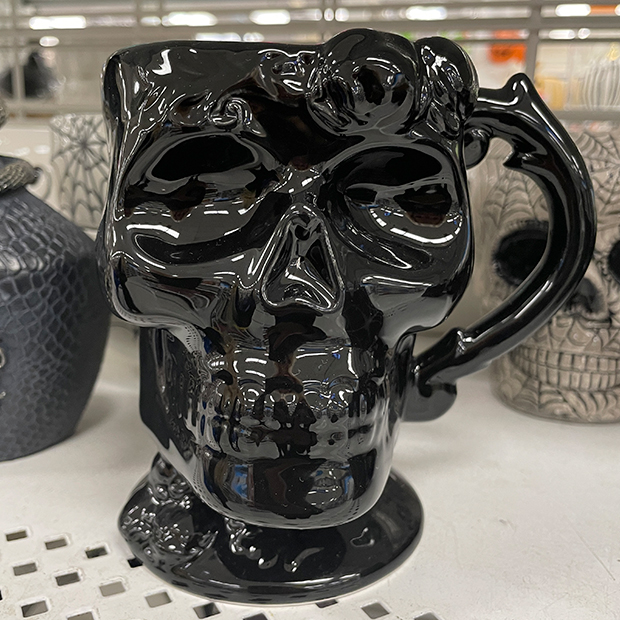 Glossy black day of the dead sculpted coffee mug from Ross.