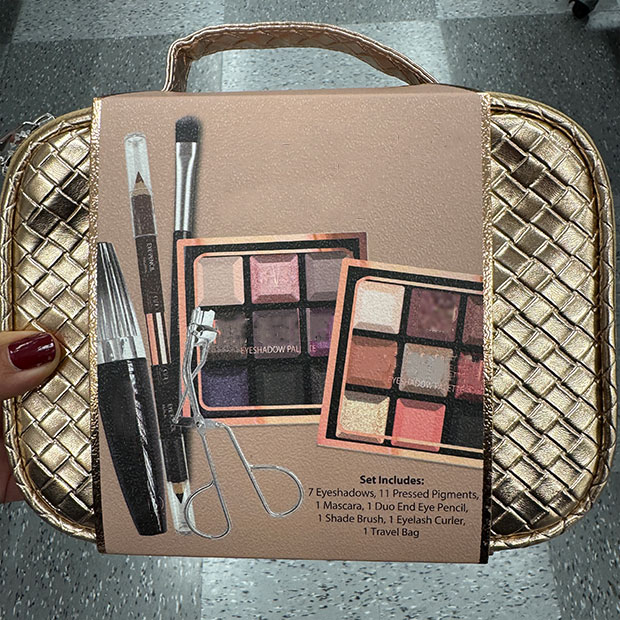 Gold beauty travel case with beauty tools and cosmetics from Ross store